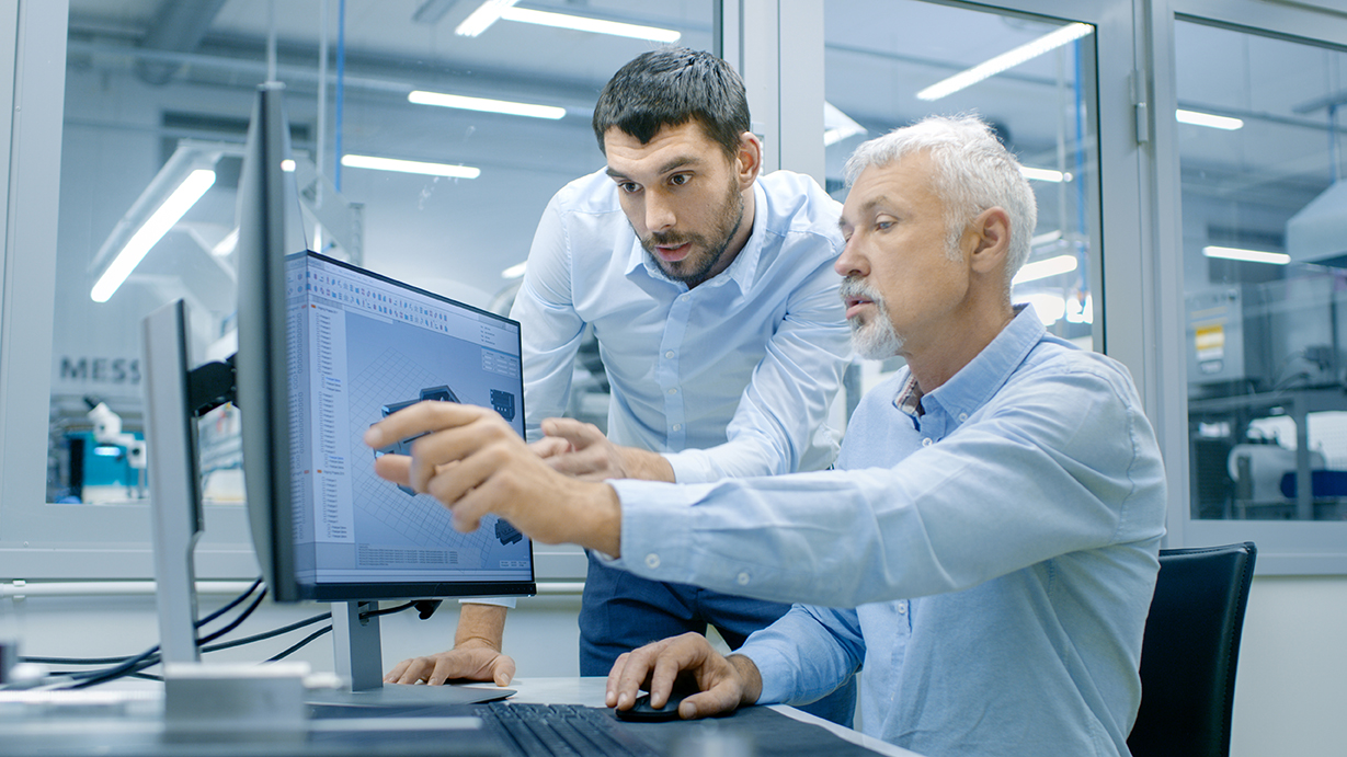collaborative working people at a desk